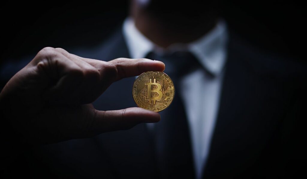 a man in a suit learned he couls buy Bitcoin anonymously