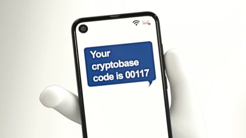 step 2 to buy crypto from a Cryptobase ATM is to enter code from phone